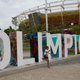 Some children use an Olympic monument as a playground (Image: AP)